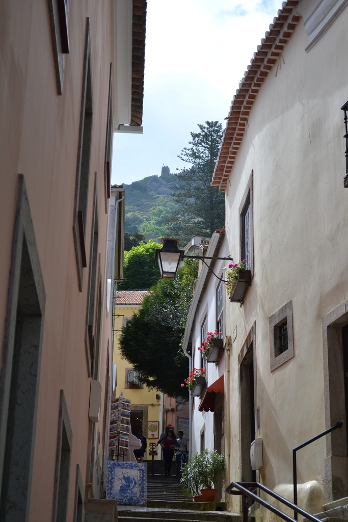 A street in Sintra with the Castelo dos mouros in the background